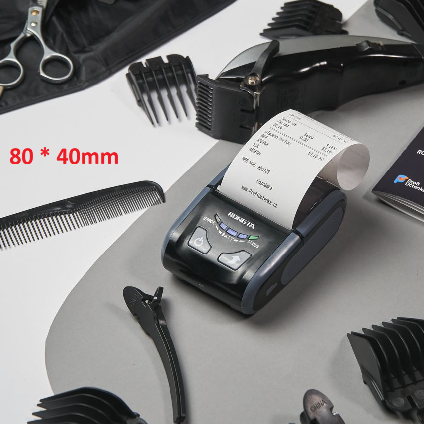 A cordless hair clipper set arranged on a gray and white surface, including the clipper, multiple black guide combs, a black comb, a black clip, a black fabric cover, and a printed manual. Red text reads '80 * 40mm'.